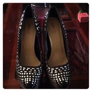 Black and silver studded high heels.